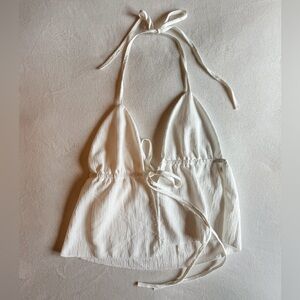 White open triangle top